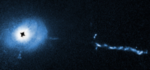 Hubble Captures Monster Black Hole That May Be Gobbling Galaxies