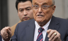 Rudy Giuliani Hawks Rudy Coffee While Dressed as Santa Amid Legal Woes