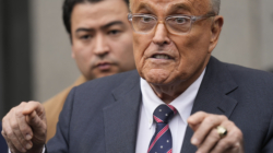 Rudy Giuliani Hawks Rudy Coffee While Dressed as Santa Amid Legal Woes