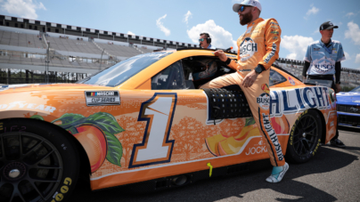 F1 Champion Brand Joins NASCAR As Justin Marks and Pitbull Strike Gold