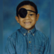 Boy Wears Eyepatch in First School Photo—Had No Idea the Danger He’d Beaten