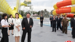 Wife of North Korea’s Kim Jong Un Reemerges With Luxury Handbag
