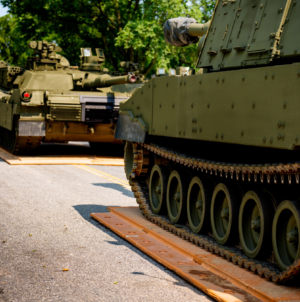 Woman Killed by Trump Military Parade Convoy Carrying Tank