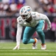 Dolphins’ Chop Robinson Exits Game With Apparent Concerning Head Injury