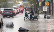 New York hit by record-breaking rainfall, at least two dead