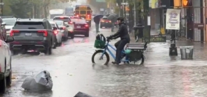 New York hit by record-breaking rainfall, at least two dead