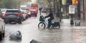 New York hit by record-breaking rainfall, at least two dead