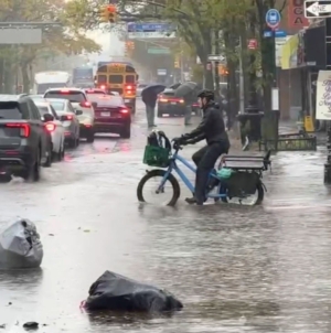 New York hit by record-breaking rainfall, at least two dead