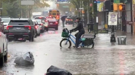 New York hit by record-breaking rainfall, at least two dead