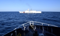China Deploys Navy To Help Coast Guard Squeeze US Ally