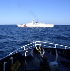 China Deploys Navy To Help Coast Guard Squeeze US Ally