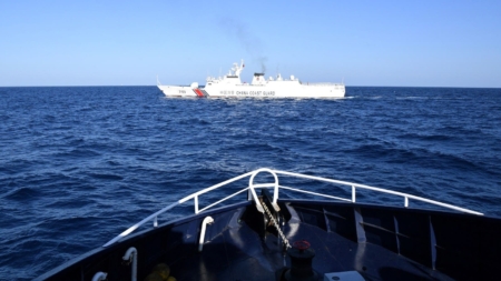 China Deploys Navy To Help Coast Guard Squeeze US Ally