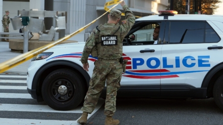 National Guard shooting suspect worked with CIA, director says