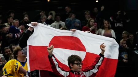 Fans Show Support for Greenland at Winter Olympics Hockey Match