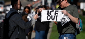Activists Hand Out ‘ICE OUT’ Towels at Super Bowl LX