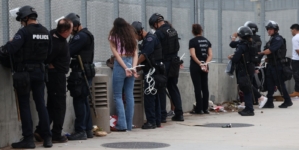Tear Gas, Arrests at LA ‘No Kings’ Protest Near Federal Prison