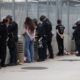 Tear Gas, Arrests at LA ‘No Kings’ Protest Near Federal Prison